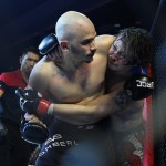 ACTORS Kiko Matos (left) and Baron Geisler grasp each other, then later on for breath, during their mixed martial arts bout Saturday night. (Kevin De la Cruz)