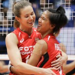 FOTON’S Lindsay Stalzer, left, and Ivy Perez celebrate after a huge rally from two sets down keyed a come-from-behind victory over Petron late Thursday in Game 1 of the PSL Grand Prix Finals at The Arena in San Juan. (Rio Leonelle Deluvio)