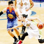 GLOBALPORT’s Terrence Romeo (right) drives against Roger Pogoy of Talk ‘N Text during the start of the PBA playoffs at the Mall of Asia Arena in Pasay City. (PBA Media Bureau)