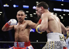 Keith Thurman punches Danny Garcia, right, during the third round of a welterweight championship boxing match Saturday, March 4, 2017, in New York. Thurman won the fight. (AP Photo/Frank Franklin II)