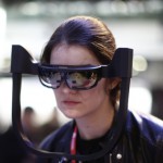 A woman uses virtual reality glasses at the Mobile World Congress in Barcelona, Spain (AP Photo/Manu Fernandez)
