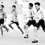 Cebu’s Kyiie Kenjie Dahili (right) crosses the finish line first to rule the boys 100-meter run of the Batang inoy Games Visayas regional trackfest at the Gov. Mariano Perdices Complex in Dumaguete City yesterday.