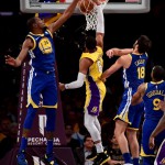 Jordan Clarkson of the Los Angeles Lakers dunks against Golden State’s Kevin Durant during their NBA game which the Warriors won, 116-114, in overtime. (AFP)