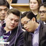 BELEAGUERED Davao City vice-mayor Paolo Duterte (left) confers with brother-in-law Atty. Mans Carpio during a recent Senate hearing. Duterte announced his resignation as city vice mayor on Christmas Day. (Czar Dancel)