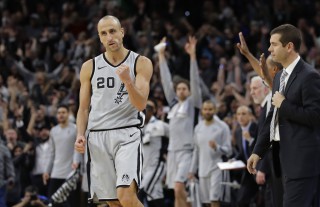 San Antonio Spurs guard Manu Ginobili pumps his fist after hitting the winning shot against the Boston Celtics. (AP)