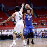 Veteran JR Quinahan of NLEX shoots against GlobalPort’s Bradwyn Guinto during their PBA Philippine Cup game yesterday at the Philippine Arena in Bocaue, Bulacan. (Courtesy of PBA)