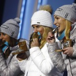 Medalists in the women's parallel giant slalom from right, Germany's Selina Joerg, silver, the Czech Republic's Ester Ledecka, gold, and Germany's Ramona Theresia Hofmeister, bronze, pose during their medals ceremony at the 2018 Winter Olympics in Pyeongchang, South Korea, Saturday, Feb. 24, 2018. (AP Photo/Patrick Semansky)
