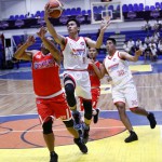 Rian Ayonayon goes for a layup against Jay-R Taganas (PBA Images)