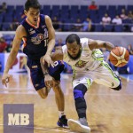 Globalport's Stanley Pringle drives past Meralco's Joseph Sedurifa (MB photo | Rio Leonelle Deluvio)