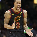 FILE - In this April 29, 2018 file photo Cleveland Cavaliers' George Hill reacts in the second half of Game 7 of an NBA basketball first-round playoff series against the Indiana Pacers in Cleveland. Hill had a good reason to miss practice _ he graduated. While his teammates were getting in a last workout before facing Boston in the Eastern Conference finals, Hill received his degree from IUPUI. Hill was one of two student speakers at the commencement ceremony. (AP Photo/Tony Dejak)