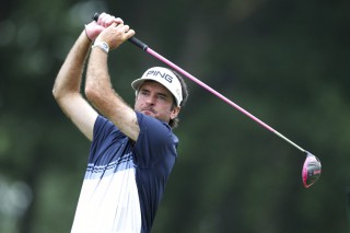 Bubba Watson tees off on the 18th hole during the final round of the Travelers Championship golf tournament. (AP Photo/Stew Milne)
