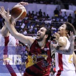 SAN MIGUEL’s Christian Standhardinger (center) is fouled by Ginebra’s Greg Slaughter (left) as Japeth Aguilar looks on during PBA action last night at the Smart Araneta Coliseum. (MB photo | Rio Leonelle Deluvio)