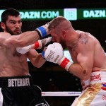 Artur Beterbiev and Callum Jonhson trade punches during a IBF World Light-Heavyweight title fight at Wintrust Arena on October 6, 2018 in Chicago, Illinois. (JONATHAN DANIEL / GETTY IMAGES NORTH AMERICA / AFP)