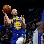 Golden State Warriors guard Stephen Curry heads to the basket for a layup during the second half of the team’s NBA basketball game against the Detroit Pistons in Detroit. (AP)