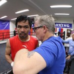 Manny Pacquiao confers with Hall of Fame trainer Freddie Roach during his first training session in the US on Monday. (Courtesy Jhay Otamias)