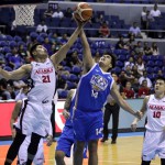 Kris Porter of NLEX battles Bryan Cruz of Alaska for the ball. (PBA Images)