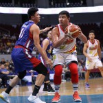 Beau Belga of Rain or Shine guarded by Ian Sangalang of Magnolia. (PBA Images)