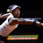 Naomi Osaka returns the ball to Croatia's Donna Vekic (THOMAS KIENZLE / AFP)