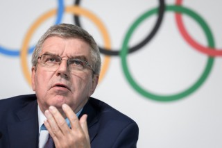 International Olympic Committee (IOC) president Thomas Bach (Photo by Fabrice COFFRINI / AFP)