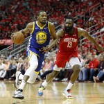 Kevin Durant #35 of the Golden State Warriors drives to the basket defended by James Harden #13 of the Houston Rockets (AFP photo)