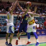 Rome Dela Rosa of Magnolia goes in for a layup against Beau Belga and James Yap of Rain or Shine. (PBA Images)
