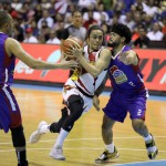 Terrence Romeo of San Miguel Beer drives hard against Justin Melton of Magnolia. (PBA Images)