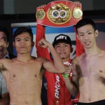 Jerwin Ancajas and Japanese challenger Ryuichi Funai strike a pose after making the weight in Stockton, CA. (Courtesy of Alvin Go)