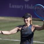 Maria Sharapova celebrates after winning against Slovakia's Viktoria Kuzmova. Sharapova won 7-6 (10-8), 6-0. (Photo by JAIME REINA / AFP)