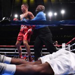 Gennady Golovkin of Kazakhstan (red trunks) knocks out Steve Rolls of Canada (white trunks) in the fourth round of their Super Middleweights fight at Madison Square Garden on June 08, 2019 in New York City. (Sarah Stier/Getty Images/AFP )