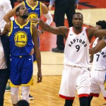 Golden State Warriors forward Kevin Durant (35) walks off the court after sustaining an injury as Toronto Raptors center Serge Ibaka (9) gestures to the crowd (Chris Young/The Canadian Press via AP)