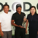 Juvic Pagunsan holds his trophy as he poses with Bacolod Golf Club general manager Gerald Gomez (left) and Philippine Golf Tour executive director Narlene Soriano after dominating the ICTSI Bacolod Golf Classic in Murcia, Negros Occidental over the weekend.