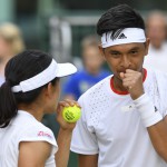 Indonesia's Christopher Rungkat (R) and his partner Japan's Shuko Aoyama (L) (Photo by GLYN KIRK / AFP)