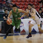 Raymark Matias of Hazchem drives against Grevanni Rublico of Nailtalk (PBA Images)