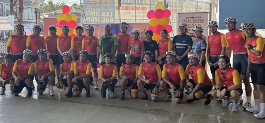 MMDA General Manager General Nicolas Torre III (green jersey), MPTC Tour of Luzon Chief Organizer and CEO Arrey Perez (sixth from left), Mad Management head Dinah Remolacio (black jersey) with the cycling executives. MPTC ToL Photo